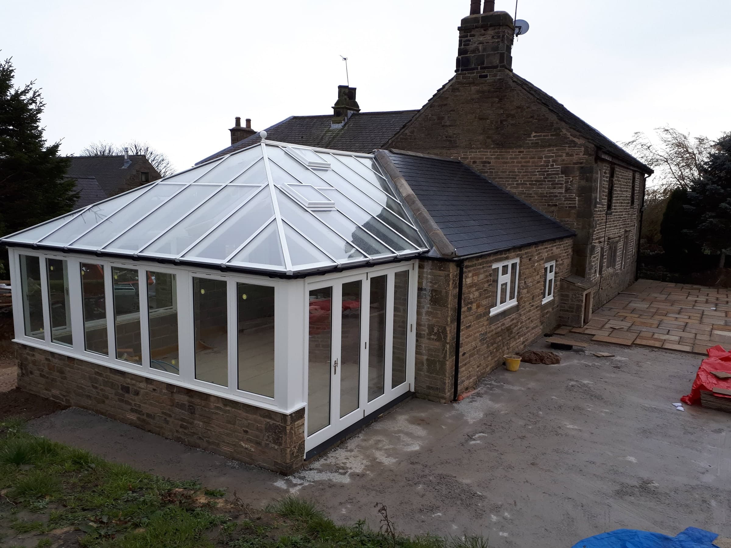 Completed glazed extension on a traditional stone property in Dronfield