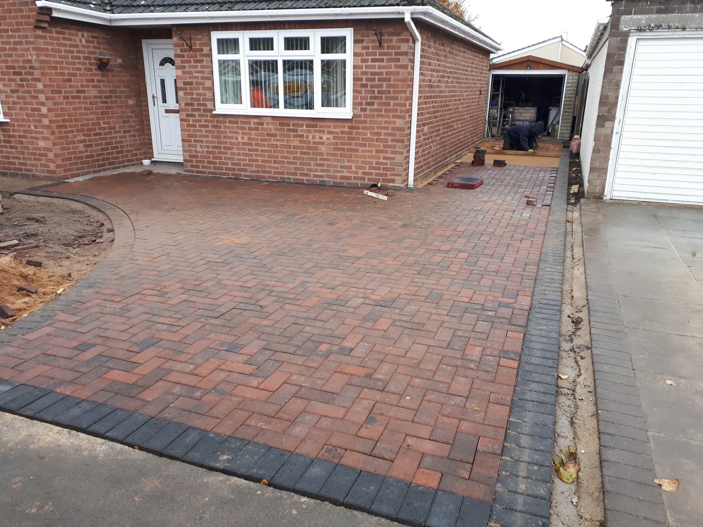 Finished block-paved driveway with contrasting edging